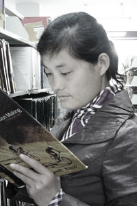 Young woman reading in Nankai university library